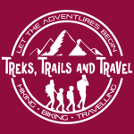 Logo for Treks Trails and Travel, featuring a mountain range with a silhouette of a family of 4 walking with backpacks below the name. The text around the outside reads "Lets the Adventures Begin" and " Hiking Biking Travelling"