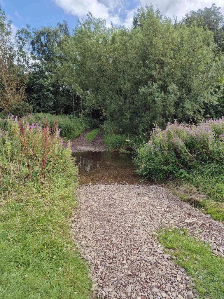 River Eye Water Ford across a gravel lane
