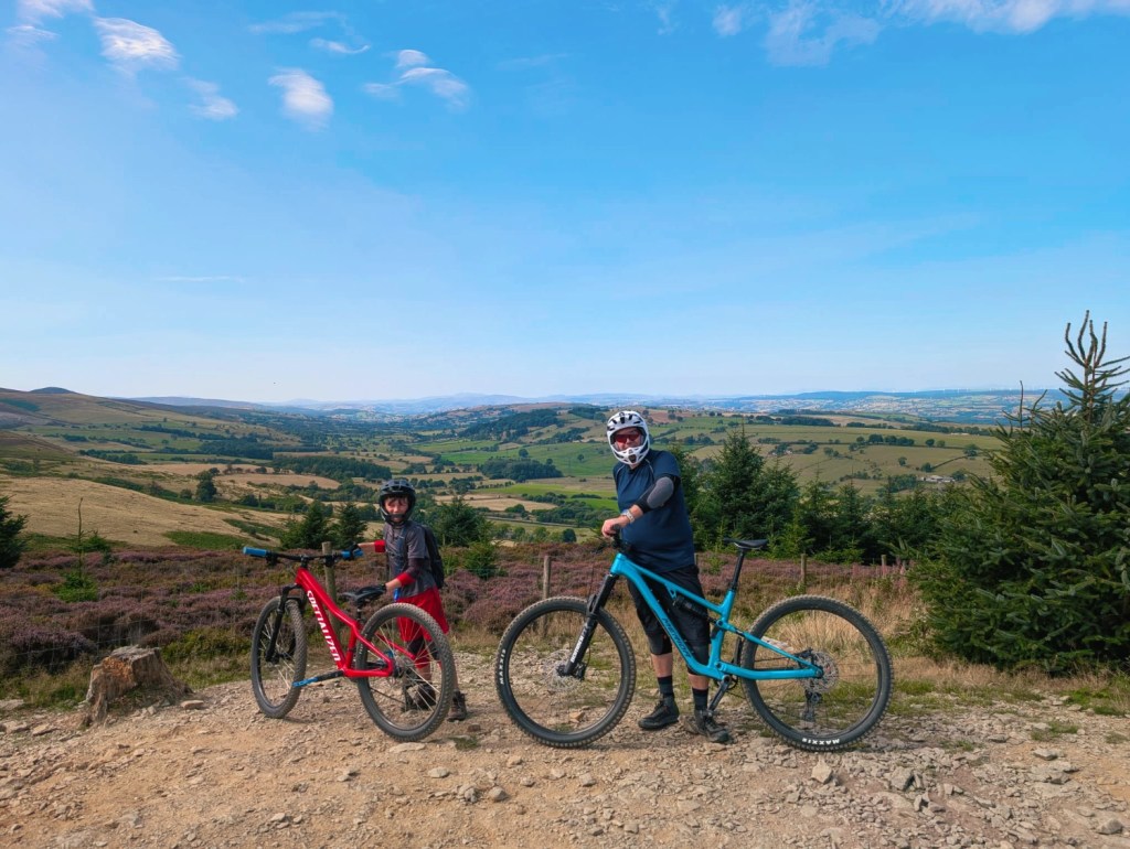 A father and son with mountain bikes in north wales llandegla